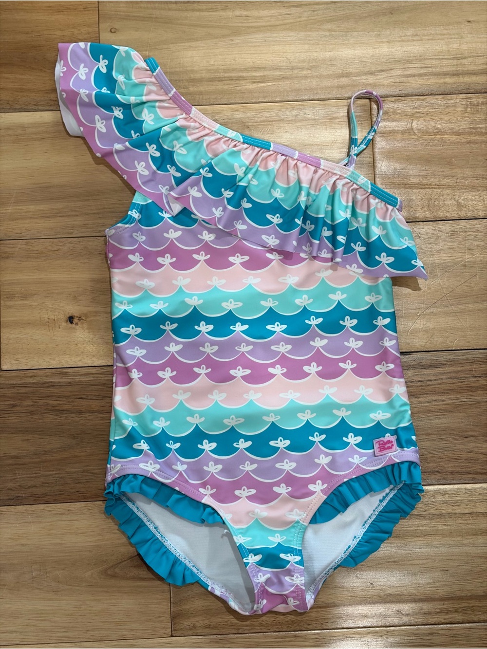 RuffleButts One-Shoulder Ruffle Swimsuit in Teal, Purple & Pink